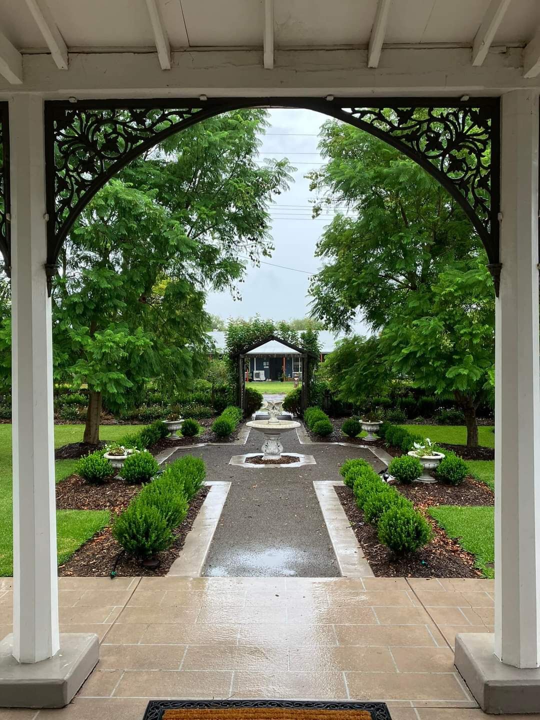 Garden and fountain seen from the front porch