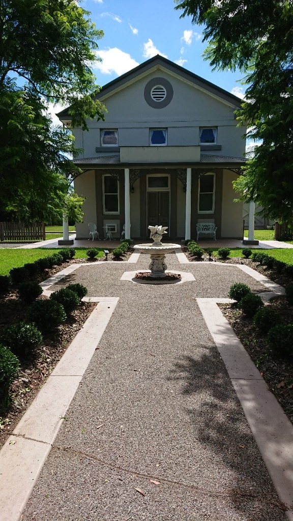 The Courthouse — path, fountain and the front porch